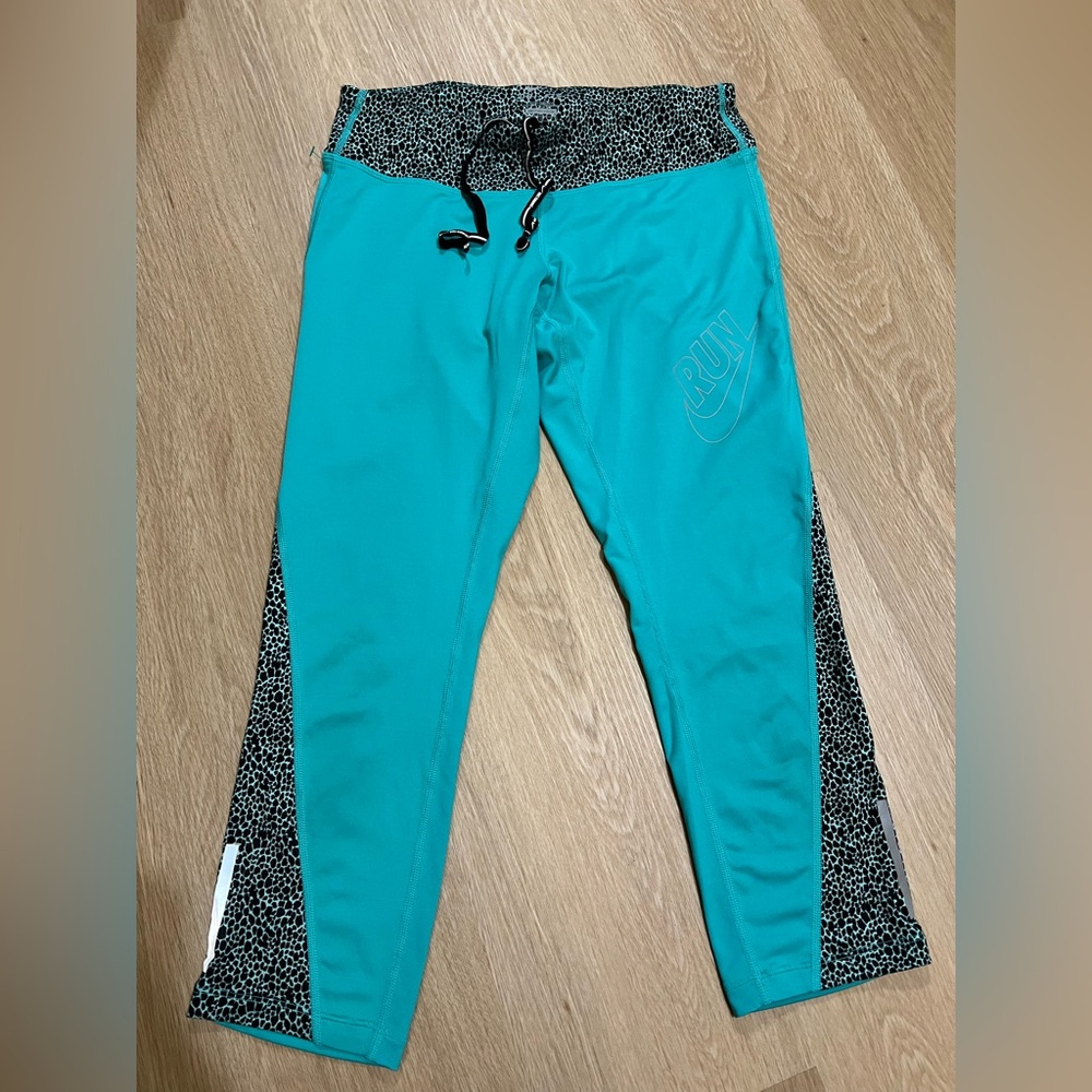 Nike Teal Capri Leggings with Black Pattern